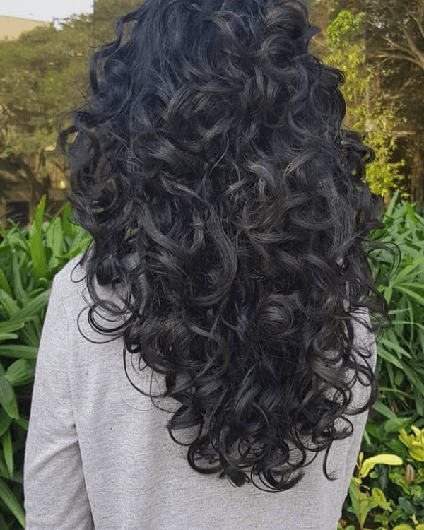 Achieve luxurious, natural curls with Bella Hararo’s Indian Remy Flat-Tip Indian Curly Hair Extensions